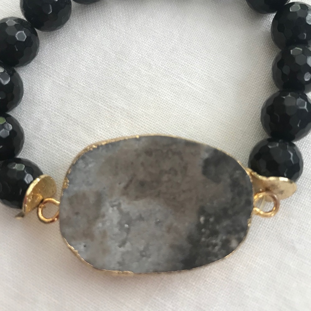 Black beaded bracelet with natural stone